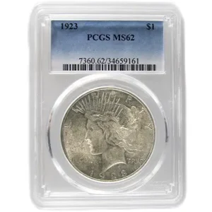 MS 62 Peace Dollar (1923) by PCGS in holder.